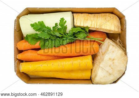 Fresh Winter Soup Pack, Uncut And Prepacked, In A Cardboard Tray, From Above, Isolated Over White. O