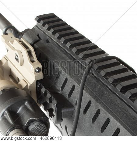 Tail Cap And Wire On A Gun With A Rail Atop
