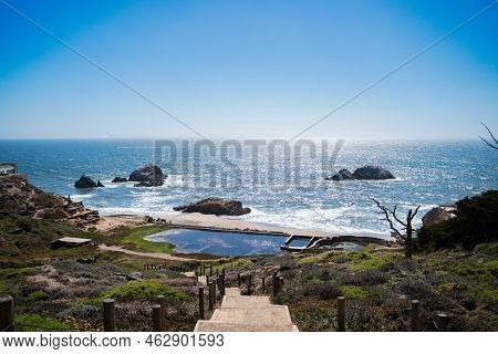 View Of Sutro Baths At Lands End Lookout On Bright Sunny Day With Ocean And Rocks. Travelling In The