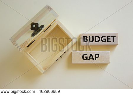 Budget Gap Symbol. Concept Words 'budget Gap' On Wooden Blocks On A Beautiful White Background, Empt