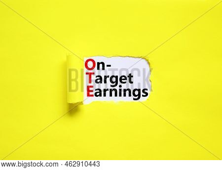 Ote On-target Earnings Symbol. Concept Words Ote On-target Earnings On White Paper On A Beautiful Ye