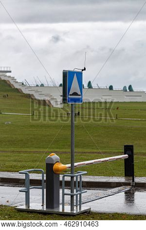 Lowered Barrier At The Checkpoint On The Road. High Quality Photo