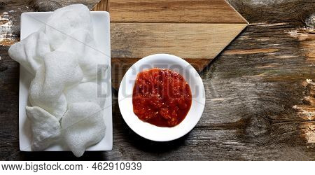 Shrimp Bread Snack In A Small Tray With Spicy Tomato Sauce For Snacking Between Meals, On A Wooden B