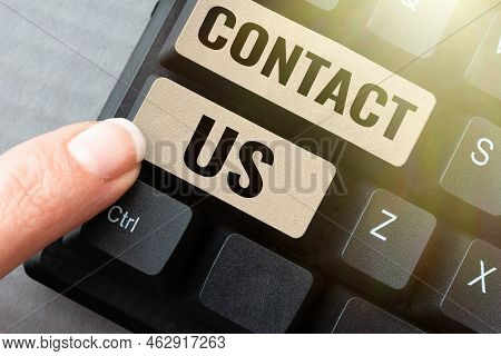 Text Sign Showing Contact Us. Business Approach Group Of Person That Rendering Costumer Service Thro