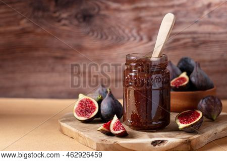 Autumn Preserves From Local Produce, Fig Jam Or Fig Marmalade On Wooden Board With Fresh, Ripe Figs,