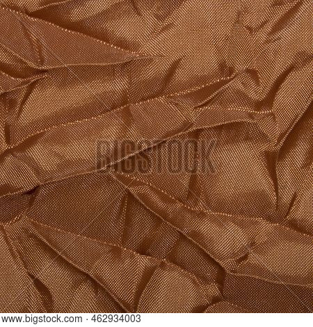 Brown Bolognese Crumpled Fabric.the Background Of The Bolognese Fabric.brown Twill Fabric.the Fabric