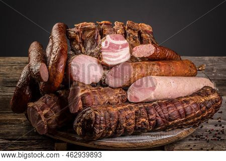 Assorted Meat Products Including Ham And Sausages. Ariety Of Processed Cold Meat Products, Top View,