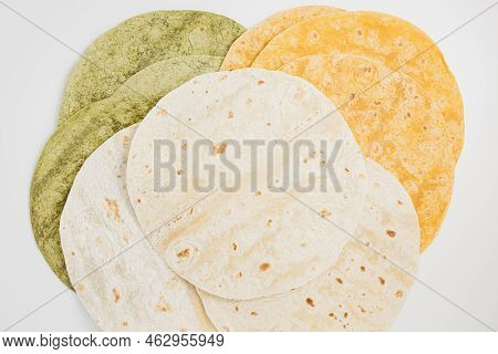 Tomato, Spinach Flavored And Plain Wheat Tortilla Wraps. Spanish Or Mexican Circular Unleavened Flat