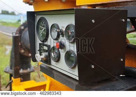 Switch Key On Control Box. Close-up Selector Switch Mounted On Outdoor Pump Control Panel In Side Vi
