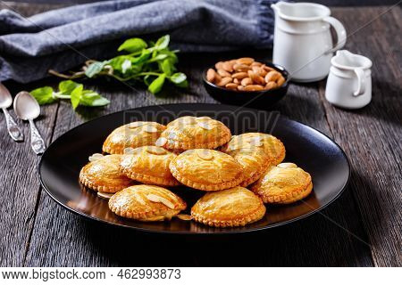Almond Butter Cookies Filled With Marzipan And Almonds Nuts Paste, Gevulde Koek, On Black Plate On D