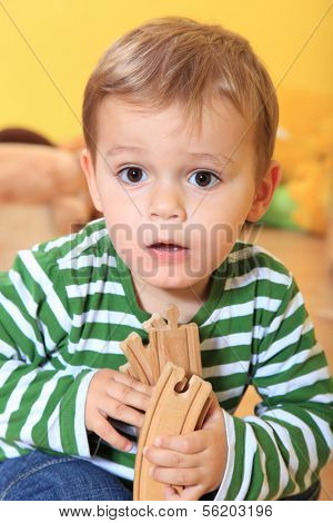 Cute caucasian toddler in kindergarten.