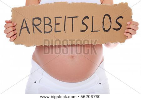 Pregnant woman holding cardboard with the german term arbeitslos (engl. unemployed). All on white background.