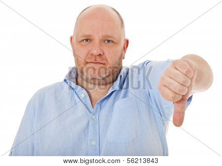 Charismatic middle aged man showing thumbs down. All on white background.