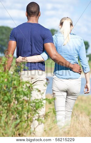 Young couple taking a walk outside.