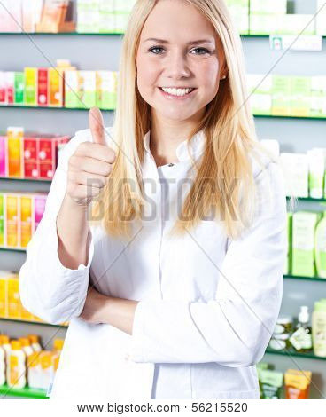 Attractive saleswoman in drugstore.