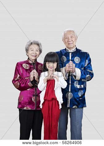 Senior Couple And Granddaughter
