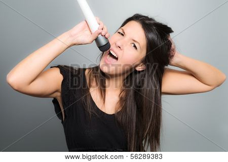 Emotional Young Woman Singing Her Heart Out