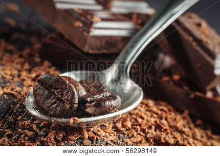 Close-up of an whole coffee beans and spoon