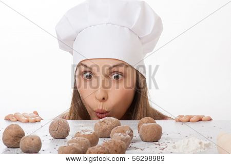dough balls and woman chef cook