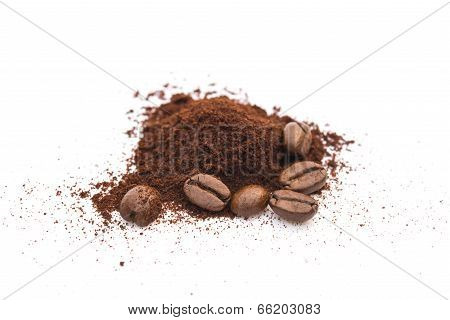 Coffee Beans And Powder On A White Background