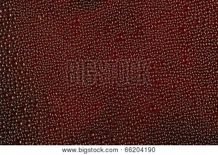 Water Drops On Dark Red Background