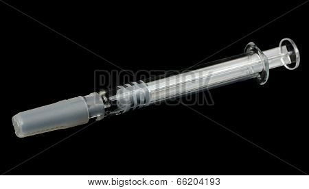Hypodermic Syringe On Black Background
