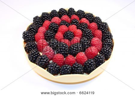 Fresh Raspberries And Blackberries In A Little Dish