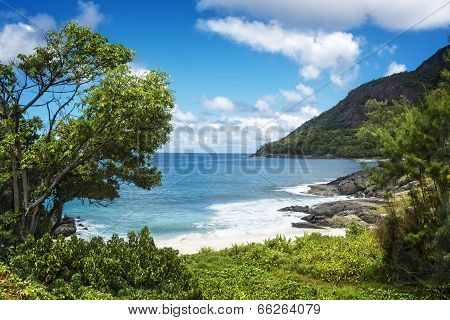 Small Sandy Beach Between Volcanic Rocks