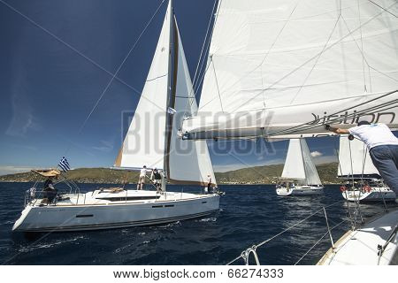 AEGEAN SEA, GREECE - APR 29, 2014: Unidentified sailboats participate in sailing regatta 