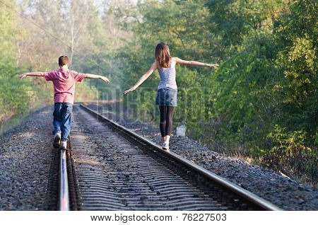 Two Children On Rails