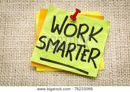 work smarter reminder on a green sticky note against burlap canvas