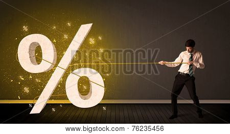 Business man pulling rope with big procent symbol sign concept on background