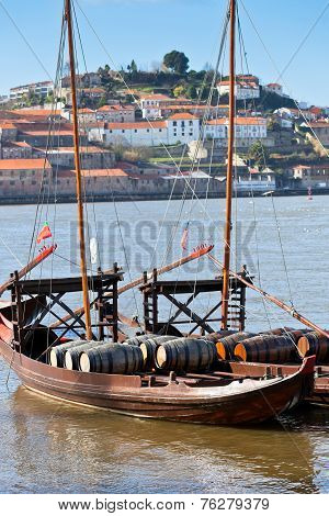 Wine Barrels In An Old Boat In Porto