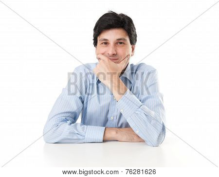 Man Sitting At The Dask And Thinking