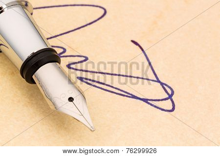 a signature and a fountain pen on yellow paper. photo icon for contract testament and graphology