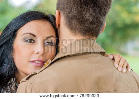 a young, laughed liebtes couple in a park