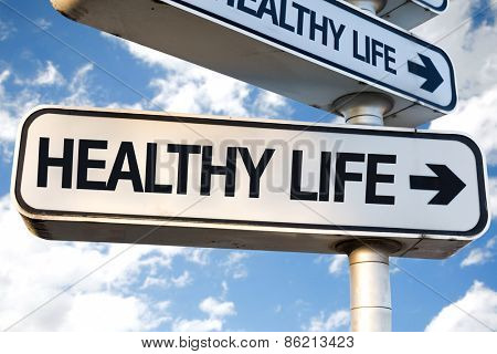 Healthy Life direction sign on sky background