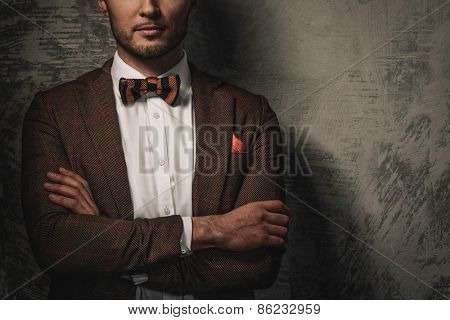 Sharp dressed fashionist wearing jacket and bow tie