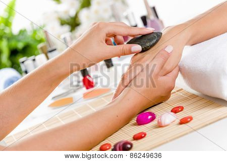 Close up of process of hand massage at beauty salon