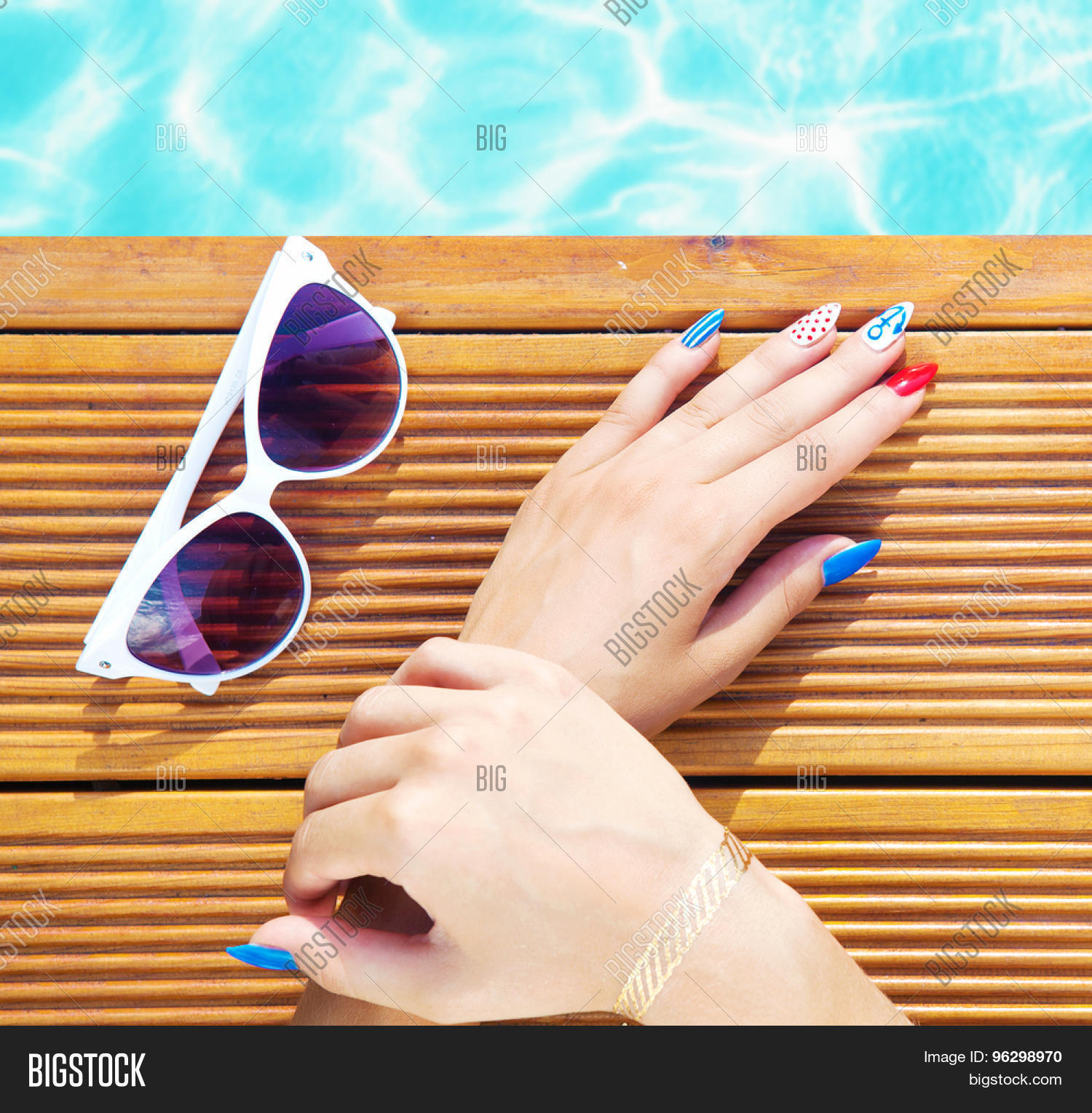 Woman Lying Down By Image Photo Free Trial Stock Woman Lying Down By The Pool Marine Sailor Gel Nails Close Up Summer Beauty Concept