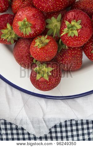 Fresh Juicy Strawberries On Vintage Enamelware Crockery On Rustic Background