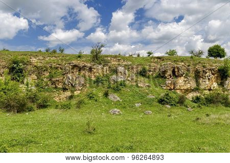 General view toward sedimentary rock in the field