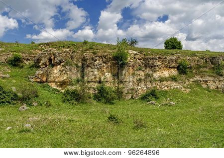 General view toward sedimentary rock in the field