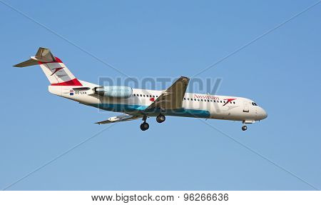 ZURICH - JULY 18: Embraer 190, Austrian landing in Zurich after short haul flight on July 18, 2015 in Zurich, Switzerland. Zurich airport is home for Swiss Air and one of the biggest European hubs.