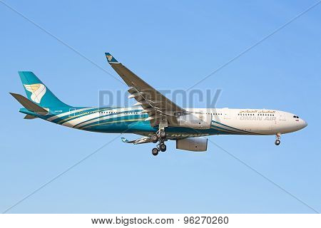 ZURICH - JULY 18: Oman Air A330 landing in Zurich after short haul flight on July 18, 2015 in Zurich, Switzerland. Zurich airport is home port for Swiss Air and one of the biggest european hubs.