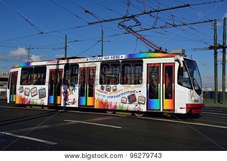 ST. PETERSBURG, RUSSIA - JUNE 27, 2015: Tram on the Tuchkov bridge across the Small Neva river. The city tramway system was created in 1907 and was the world largest in the end of XX century