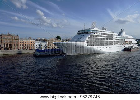ST. PETERSBURG, RUSSIA - JUNE 23, 2015: Cruise ship Silver Whisper anchored at English Embankment. The liner of company SILVERSEA may accommodate 382 guests