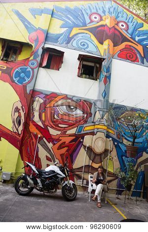 SINGAPORE - CIRCA FEBRUARY, 2015: Street art in Haji Lane. Haji Lane is the Kampong Glam neighbourhood famous for independent fashion and Middle Eastern cafes.