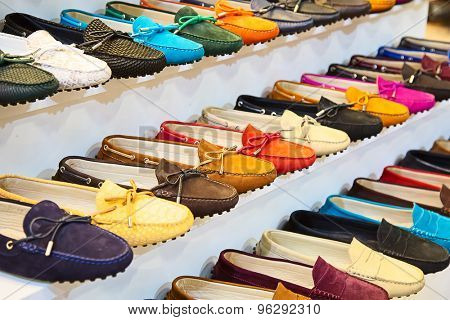variety of the colorful leather shoes in the shop 