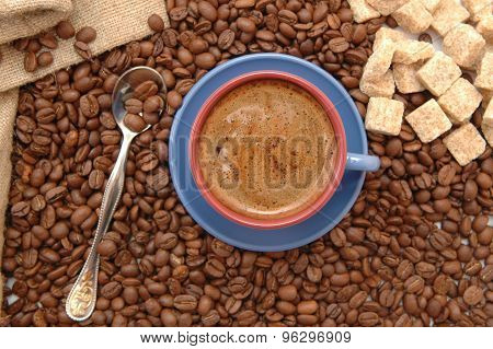 Coffee Beans And Cup With Coffee